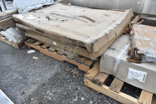 Seven new scratch and dent table tops on pallets; includes Lancaster Table & Seating models with various finishes, boxed.