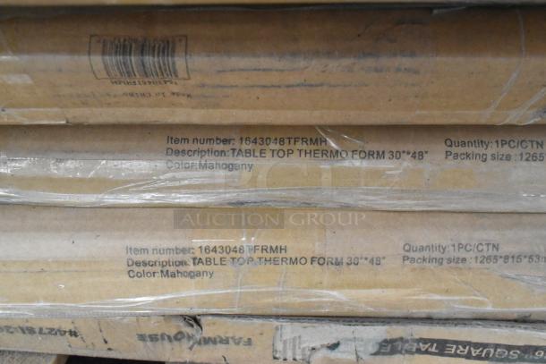 Shrink-wrapped table tops, item number 1643048TFRMH, 30"x48" mahogany finish, labeled "TABLE TOP THERMO FORM."