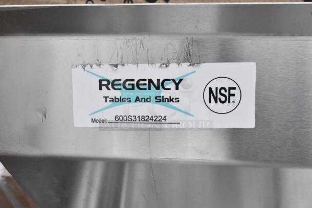 Regency 600S31824224 stainless steel 3-bay sink with dual drain boards, NSF certified. Brand new, scratch and dent condition.