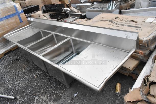 BRAND NEW SCRATCH AND DENT! Regency 600S31824224 stainless steel 3 bay sink with dual drain boards, minor cosmetic damage.