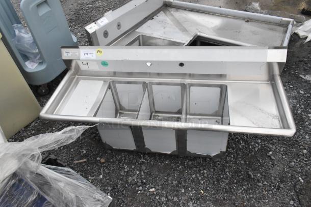 BRAND NEW Steelton 522CS31014LR 54" 18-gauge stainless steel sink with 3 compartments, 2 drainboards, and visible tags. No legs.