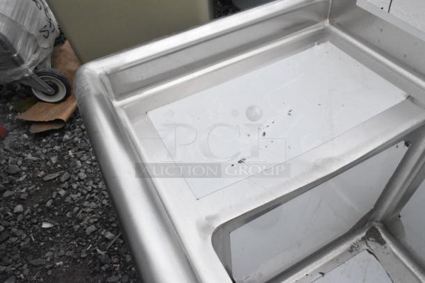 BRAND NEW SCRATCH AND DENT Steelton 522CS31014LR 54" stainless steel sink with three 10"x14"x12" bowls, 2 drainboards. No legs.