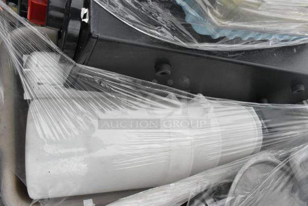 Lot of items including poly bins, poly lids, and wire shelves, wrapped in clear plastic for auction. Used condition.