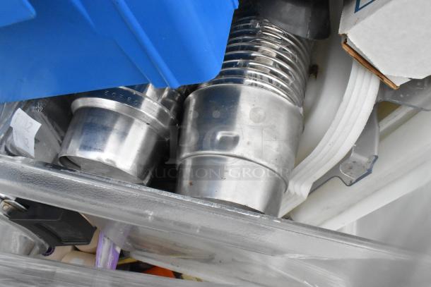 Lot of items including various glassware, metal pieces, and a gas hose, shown in mixed condition within plastic bin.