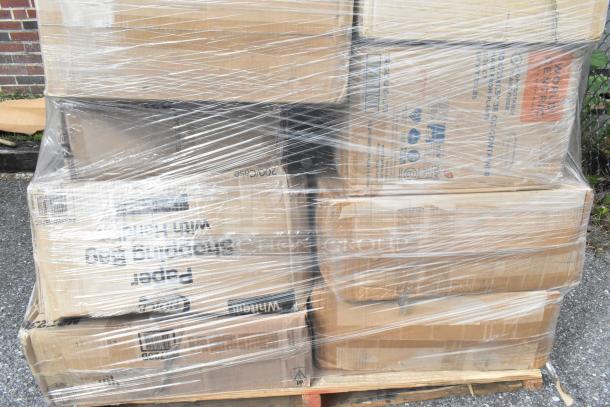 Pallet of sealed cardboard boxes containing scratch and dent lids, paper plates, coffee cups, and take out containers.
