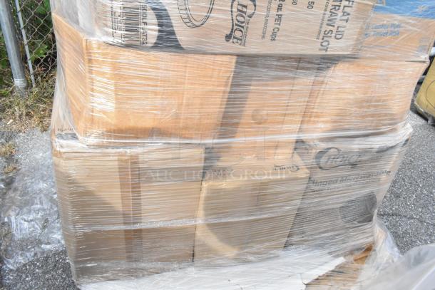 Pallet of brand new scratch and dent items, shrink-wrapped, containing ice bags, containers, and plastic spoons.