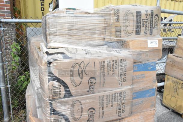Stack of 28 brand new boxes containing ice bags, containers, and plastic spoons. Boxes marked with "Choice" logo.