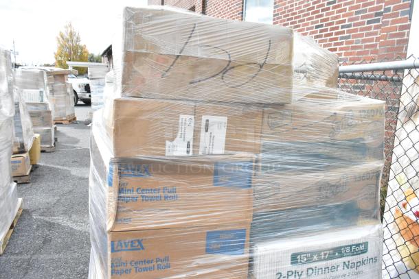 Pallet of assorted boxes of scratch and dent items, shrink-wrapped. Includes ice bags, containers, and spoons labeled Lavex, Scott.