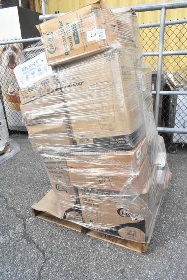 Plastic-wrapped pallet of 30 new boxes containing cold cups, lids, tumblers, and hot cups. Boxes labeled with specs and quantities.