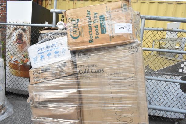 30 brand new scratch and dent items, including boxes of cold cups, lids, tumblers, and hot cups, wrapped on a pallet.