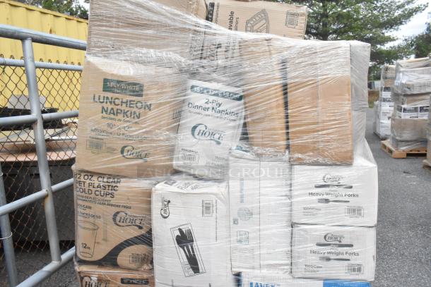 Plastic-wrapped pallet with boxes of Choice luncheon napkins, 12 oz. clear cold cups, and heavy-weight plastic forks, all new.