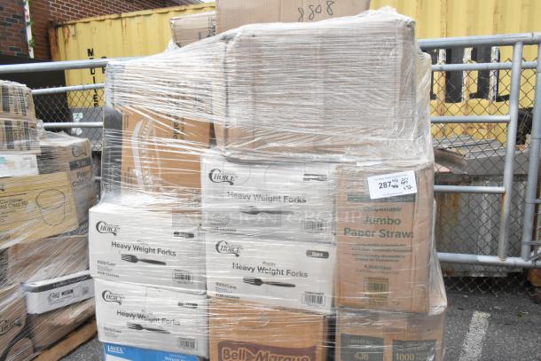 Palette of 32 brand new scratch and dent items, including boxes of napkins, cold cups, and plastic forks, wrapped in plastic.