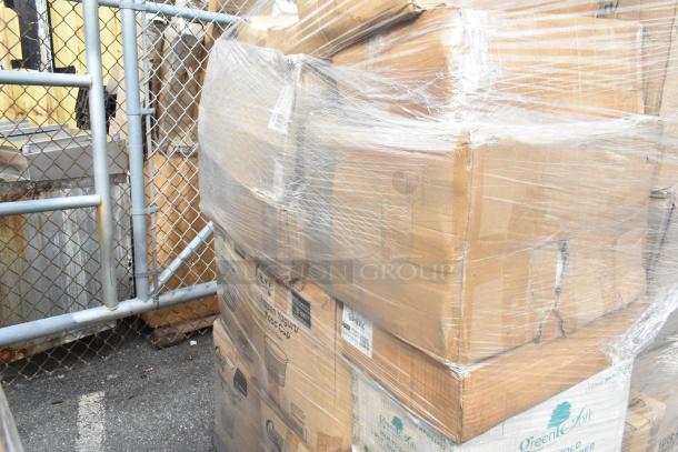 Pallet of assorted scratch and dent items, including food cups and paper bags, wrapped in plastic. Multiple boxes visible.