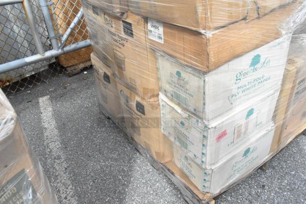 Pallet of boxed scratch-and-dent items, including GreenSoft paper and food cups. Boxes show labels and are shrink-wrapped.
