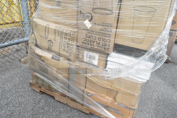Pallet with boxes of Choice clear plastic cold cups and ProXsource roll towels, wrapped in plastic, scratch and dent condition.