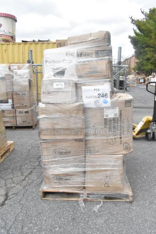 34 brand new scratch-and-dent items on a pallet, including portion cups, cold cups, poultry pads, hot cups, shrink-wrapped with visible labels.