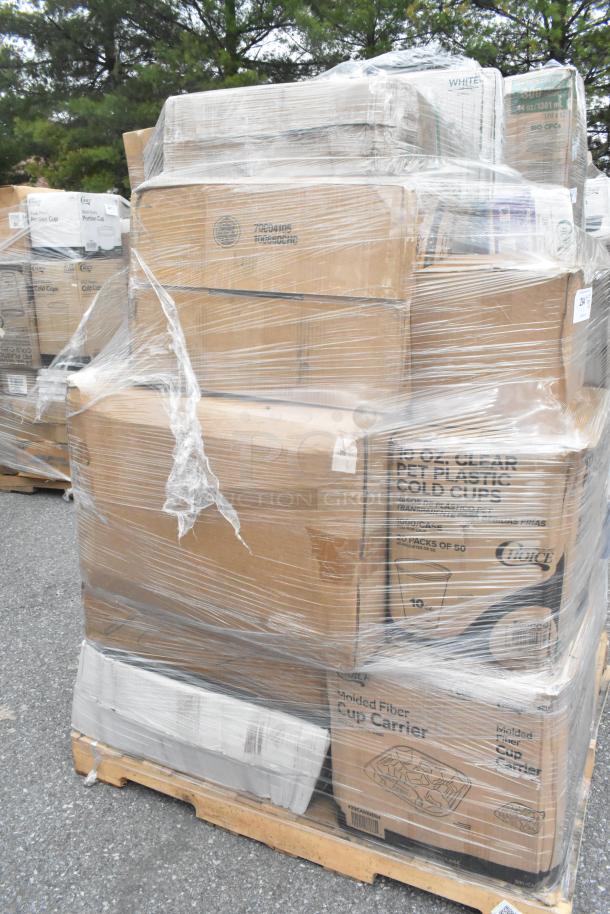 Plastic-wrapped pallet of 21 brand new scratch and dent items, including bath tissue, plates, cups, trays, and cup carrier boxes.