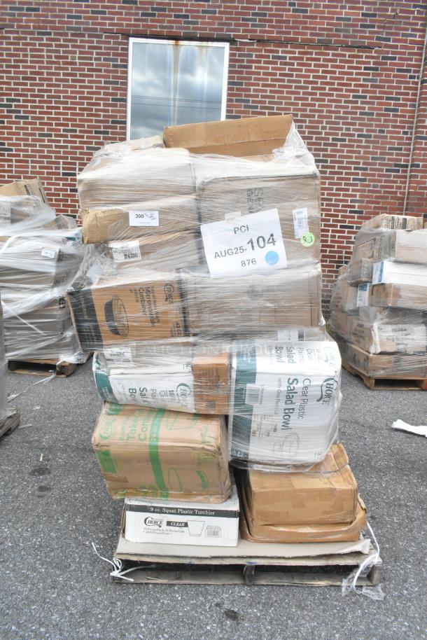 Pallet of mixed scratch and dent items, including cold cups, can liners, and takeout containers. Various brands visible, plastic-wrapped.