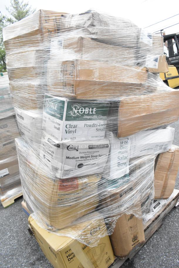 Pallet of 32 new scratch-and-dent items including Noble gloves, Choice soup spoons, wrapped for auction, various boxes visible.