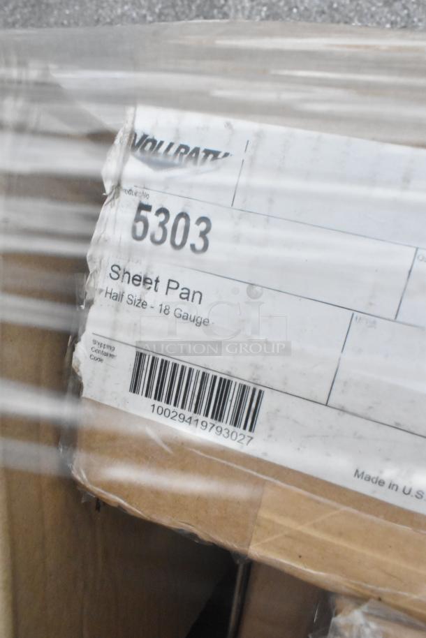 Label showing "Vollrath 5303 Sheet Pan, Half Size - 18 Gauge." Box in clear packaging, item likely brand new.