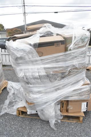 Pallet with 20 new scratch and dent items including Choice cups and deli containers, wrapped in plastic.