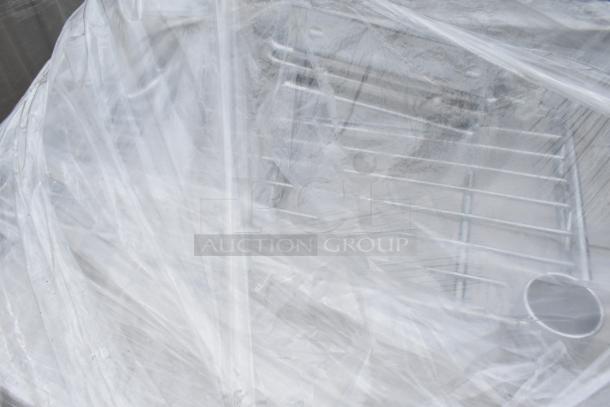 Packaged stainless steel double Speedwell and wire shelf; scratch and dent, in clear wrap, auction lot of 25 items.