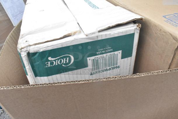 Cardboard box labeled Choice showing a slightly damaged corner, containing model 966UPWIDEKFT OneUp dispenser napkins.