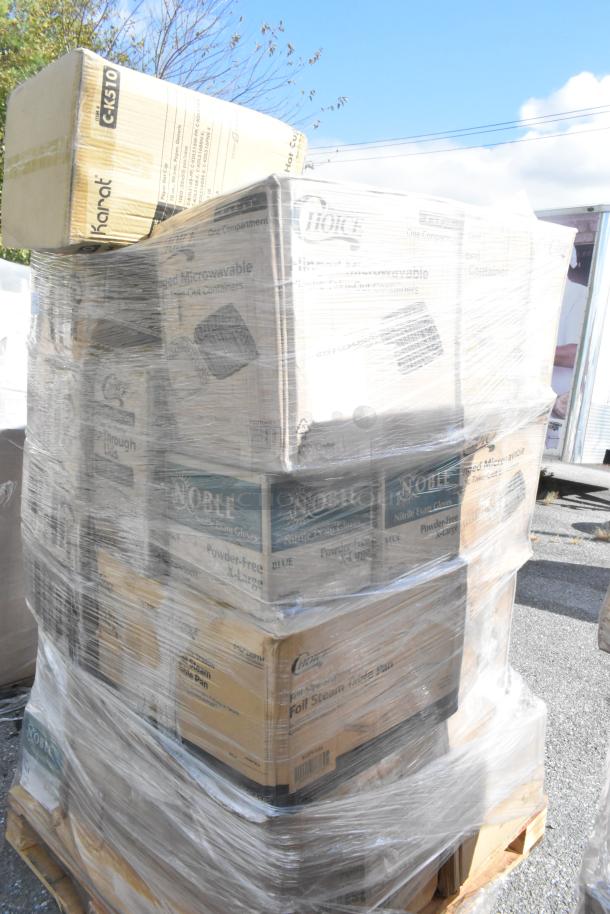 Boxes of new scratch and dent items including baking molds, gloves, muffin containers, and cold cups, wrapped on a pallet.