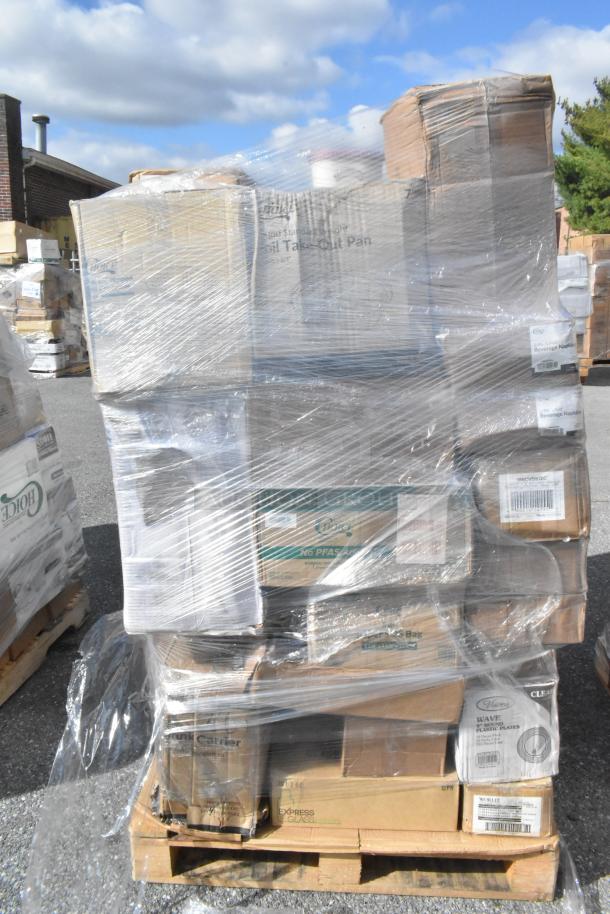 Pallet of 36 items wrapped in clear plastic, including glassware, storage boxes, and other assorted new items with visible labels.