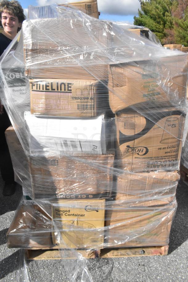 Pallet of 23 new scratch and dent items, including napkins, liners, cups, and containers, wrapped in plastic.