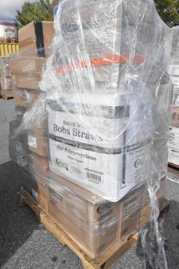 Shrink-wrapped pallet of scratch and dent items including plates, cups, and boba straws. Visible labels on boxes.