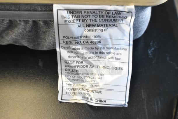 Label detailing polyurethane and polyester materials in a Granffidor AV Technologies lap tray, made in China.