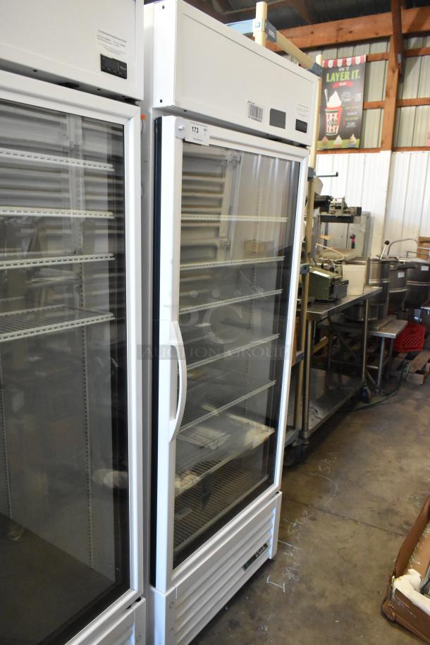 2021 True TSCI-600R-G-PH commercial single door cooler, glass front, poly racks, 115V, used condition, model visible.