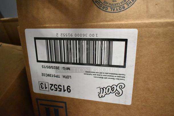 Box of Scott Foam Skin Cleanser with barcode and lot number TP5139632. Includes other items like reams of paper.