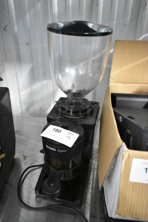 2 Brega/Bunn espresso bean grinders, 115 volts, 1 phase. Used condition with label indicating auction lot #180, quantity x2.