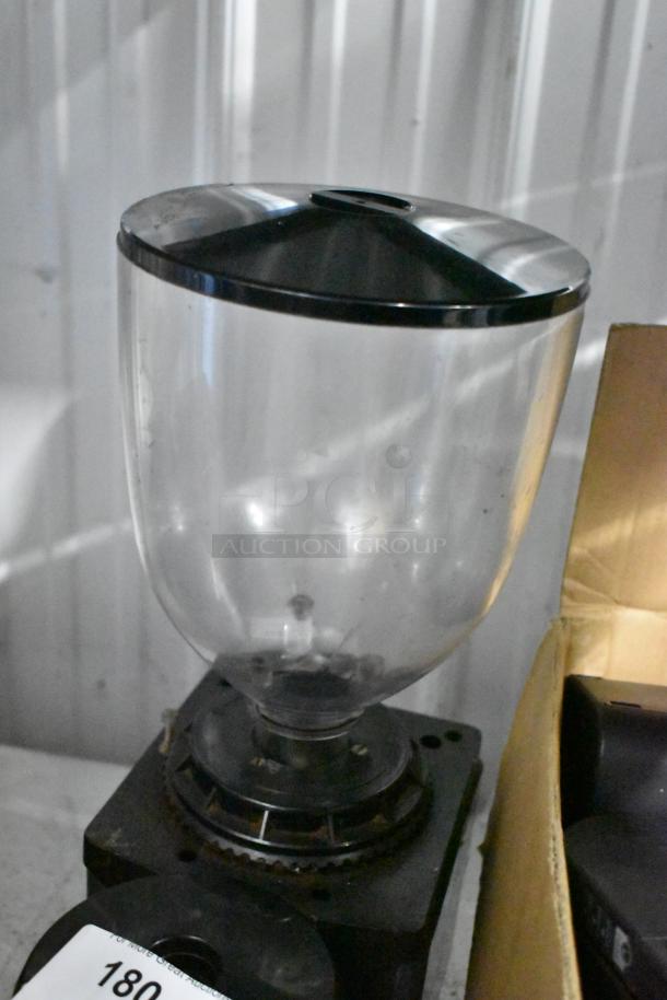 2 Brega/Bunn espresso bean grinders, clear hopper, metal base. 115V, 1 phase. Slight wear. Auction includes two units.