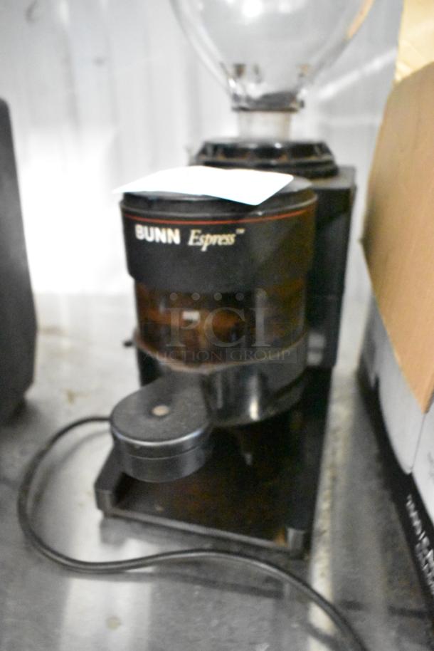 Two Bunn espresso bean grinders, 115 volts, 1 phase, featuring durable construction and efficient grinding performance.