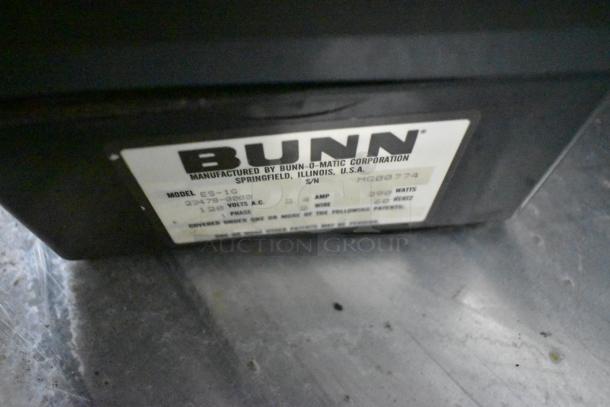 Two Brega/Bunn espresso bean grinders, 115 volts, 1 phase. Features Bunn branding, model ES-1G.