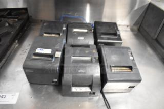Six Epson receipt printers, models M129C, M188B, TM-T20II, showing signs of use. Auction lot includes all shown units.