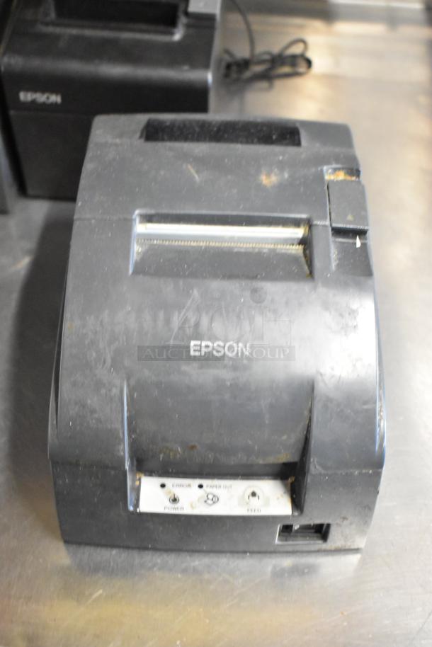 Six Epson receipt printers including models M129C, M188B, TM-T20II. Used condition with visible wear.