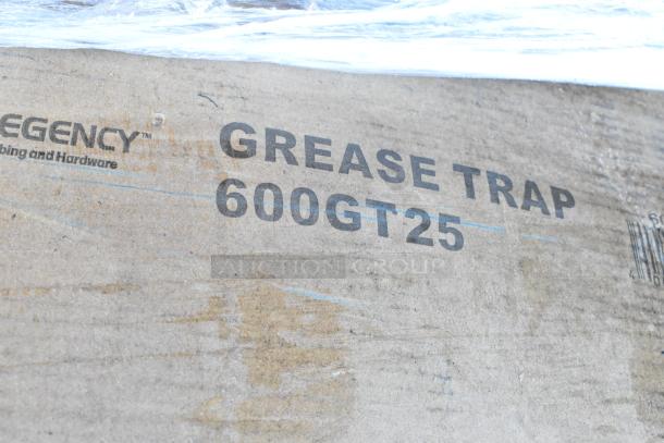 Cardboard box with "Regency" and "GREASE TRAP 600GT25" printed, indicating a 50 lb. 25 GPM grease trap inside.