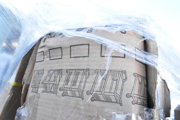 Pallet of assorted brand new scratch and dent items, including Regency grease trap, Flash Furniture table, and Rubbermaid cart.