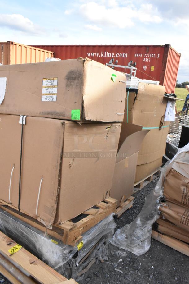 Lot of pieces, including 24"x75" shelving and door. Brand new, scratch and dent condition. Boxes with fragile labels on pallets.