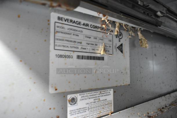 Beverage Air UCRD93A-4-23 cooler label, showing model, specs: 115V, 1 phase; used commercial condition, visible debris.