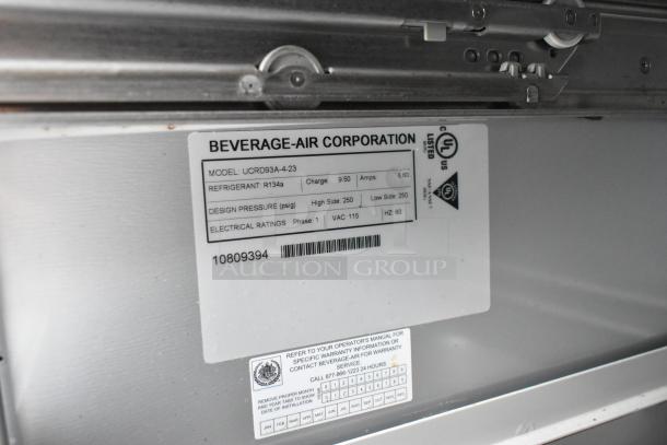 Beverage Air UCRD93A-4-23 undercounter cooler label showing model, refrigerant R134a, and electrical ratings.