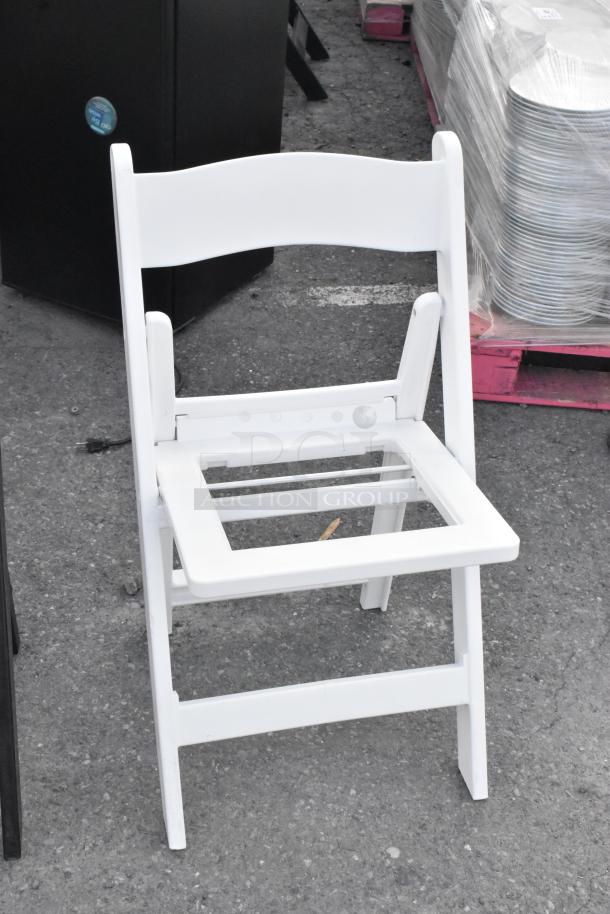 White folding banquet chair, sturdy design, suitable for events. Condition: good. Auction for 39 chairs, bid multiplies by 39.