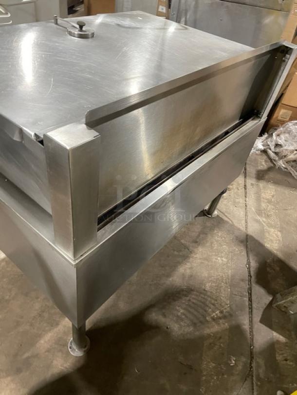 Cleveland Range stainless steel electric tilting braising pan, single spout swing faucet, sturdy legs, excellent condition.