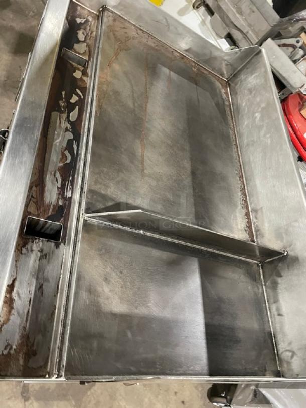 WoodStone stainless steel natural gas countertop plancha griddle with back & side splash, undershelf cart, on casters.