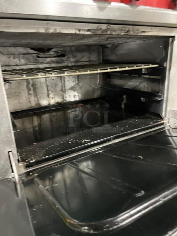 Vulcan commercial stainless steel 6-burner range/oven combo with backsplash and salamander broiler; includes wired oven rack.