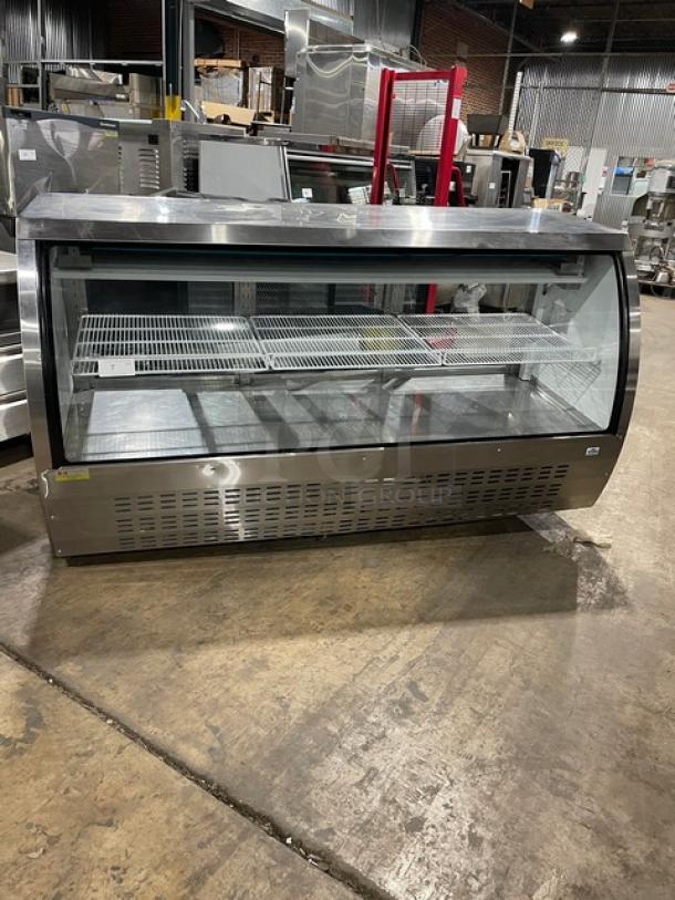 Alamo XDC200 stainless steel deli display with curved glass, poly-coated rack, and rear sliding glass doors. Model SN: 6606315117010512, 110V.